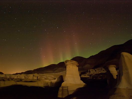 'Hoodoos and aurora in Drumheller, Alberta' Photo by Keith E. Doucet CC BY-SA 3.0 Via Wikimedia Commons