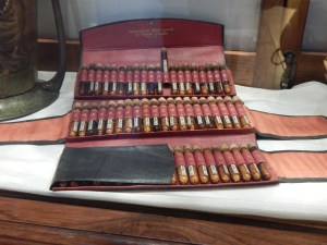 Pharmacists's set with pill tubes in the Hash, Marijuana & Hemp Museum, Amsterdam. Photo by Lord Toran CC0